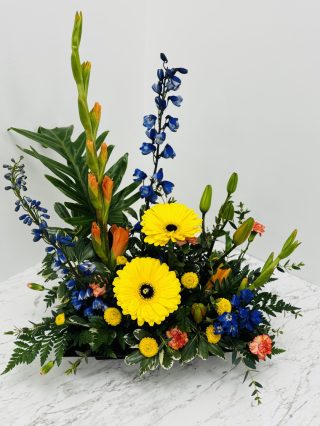 Arrangement Gerbera Daisy Delphinium Gladiola Yellow Blue Orange Bright